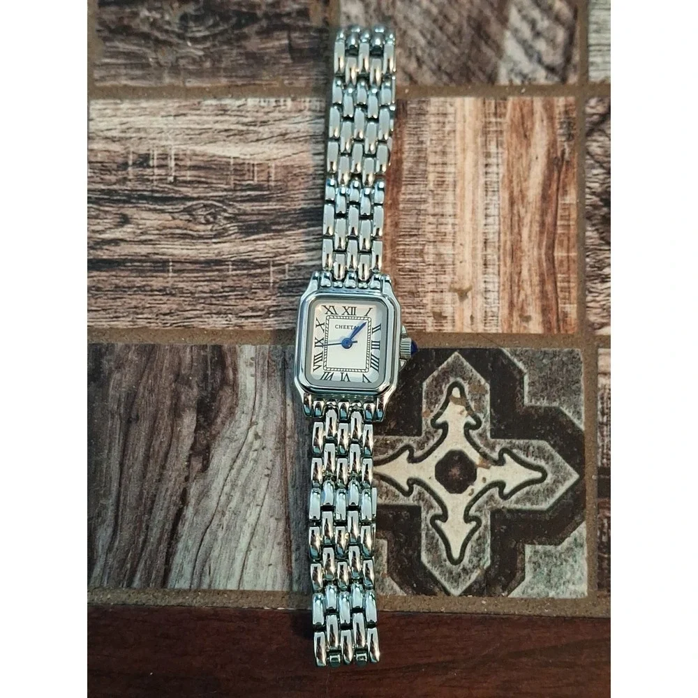 NIB CHEETAH CH-1501 Silvertone,Quartz Mvmnt Womens Watch. Stainless,Adjustable.